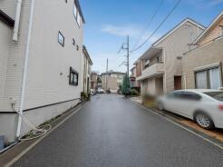 1号棟 前面道路含む現地写真
