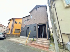 草加市金明町
