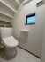 階段下を有効活用したトイレスペース。
便座はもちろんウォシュレット。

