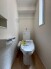 階段下を有効活用したトイレスペース。
便座はもちろんウォシュレット。

