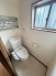 階段下を有効活用したトイレスペース。
便座はもちろんウォシュレット。

