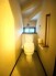 階段下を有効活用したトイレスペース。便座はもちろんウォシュレット。

