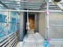 ポーチのついた新築分譲物件。玄関の印象はいかがでしょうか？入口からご覧ください。
