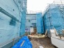 3号棟 工事の足場に囲まれた現場の様子が伝わり、新しい住まいの完成へと期待が高まる風景です
