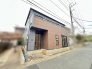 落ち着いた色合いの外観が調和する、洗練された佇まいが心地よい住まい