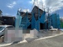 新しい暮らしの始まりを感じさせる、静かな街並みに馴染む外観の建築風景です。