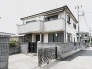 落ち着いた街並みに溶け込む、端正で穏やかな佇まいの住まいが日々の暮らしを包み込みます。