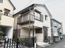 周囲の街並みと穏やかに調和し、日々の暮らしに静かな安らぎをもたらす住まいです。