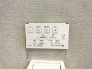 落ち着いた色合いの壁面にすっきりと収まる機能的な設備が心地よい空間を演出する
