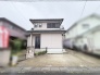 落ち着いた色合いの外壁と整った佇まいが調和する、穏やかな街並みに馴染む外観。