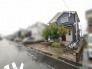 落ち着いた色合いの外観と豊かな植栽が調和する、穏やかな佇まいが魅力の住まい。