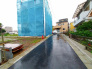 1号棟 前面道路を含む現地写真
