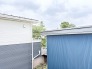 周辺の緑と建物が調和する穏やかな景色が日常に心地よさを添えてくれます。
