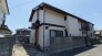 落ち着いた住宅街の雰囲気に馴染む、日々の暮らしに安らぎを感じさせる佇まいです。