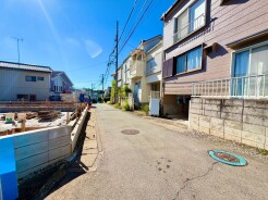 1号棟 前面道路を含む現地写真